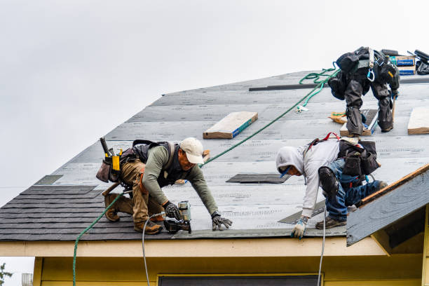 Professional Gutter Installation technician working in Bayport, NY